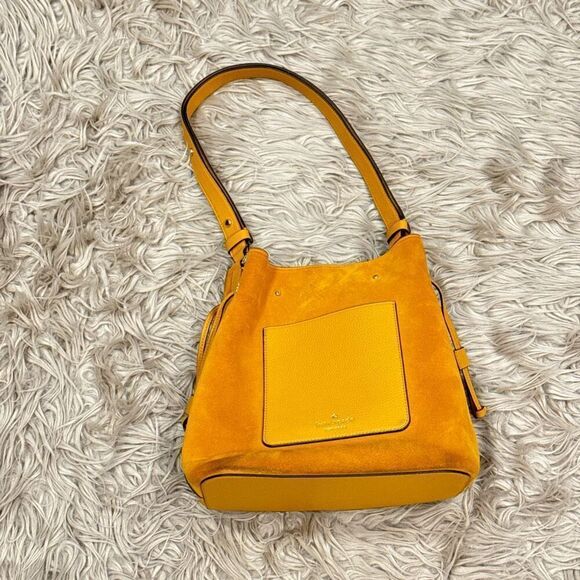 kate spade Handbags - Kate Spade Yellow Suede Bucket Bag